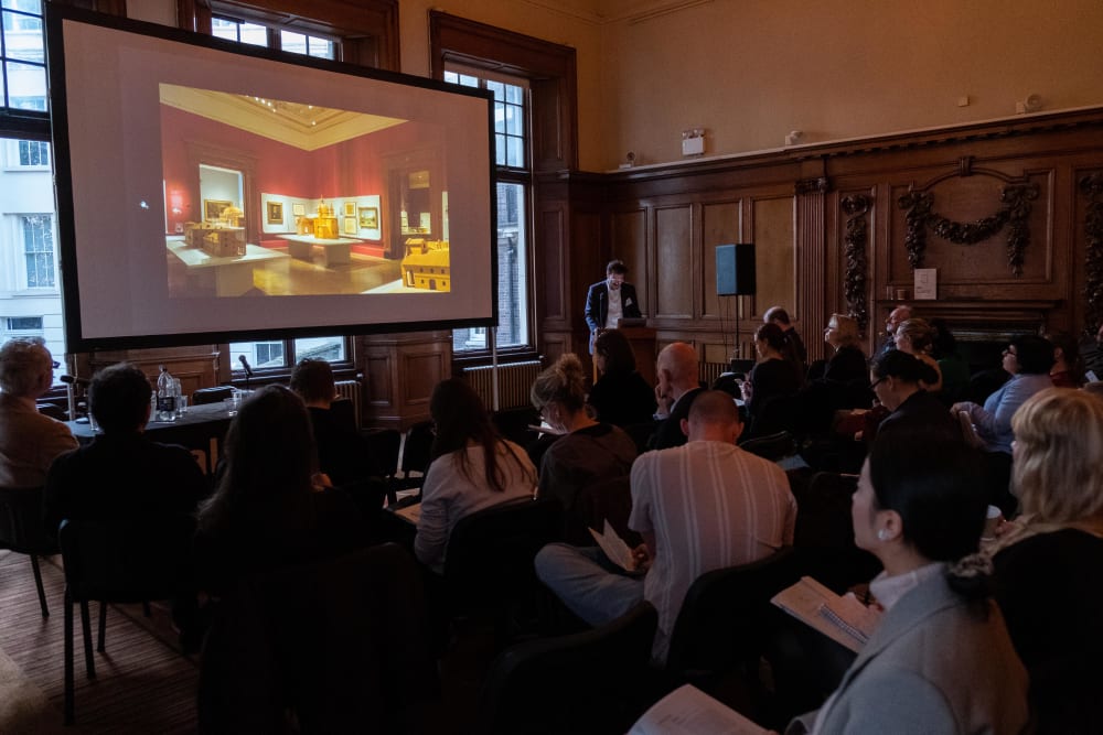 Owen Hopkins presenting his work to the audience