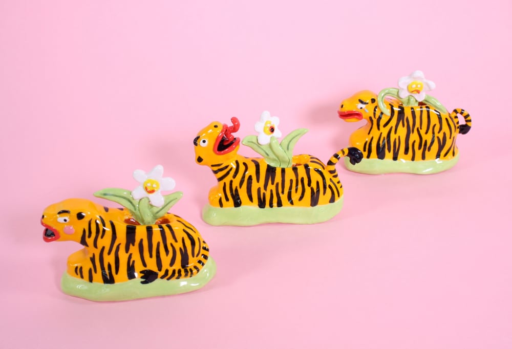Three ceramic tigers