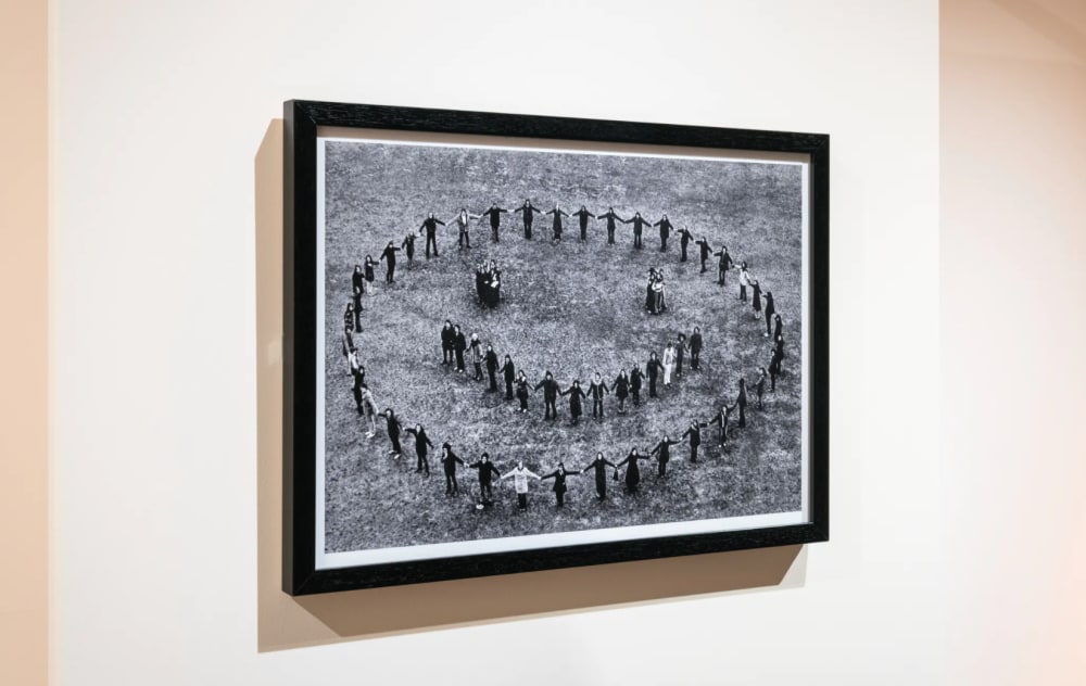 Photo of people arranged into a smiley face