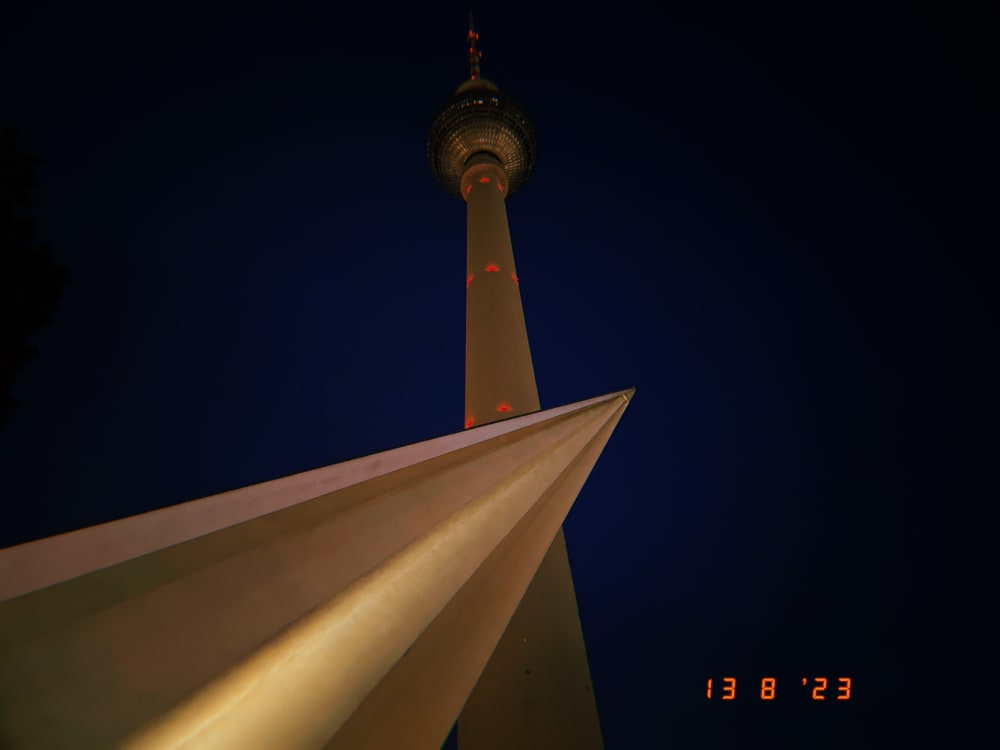a photograph of The Fernsehturm taken at night