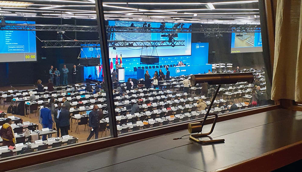 Photograph of a large meeting venue.