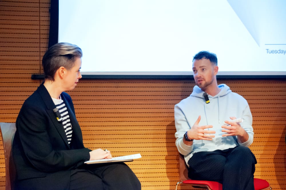 Gabby and Daniel talking on the panel