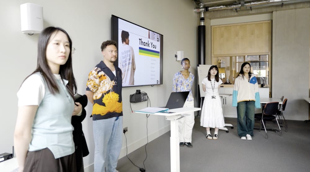 MA Fashion Marketing and Global Cultures students presenting pitches to Mango. Still taken from a video by Orlando Collegaro.