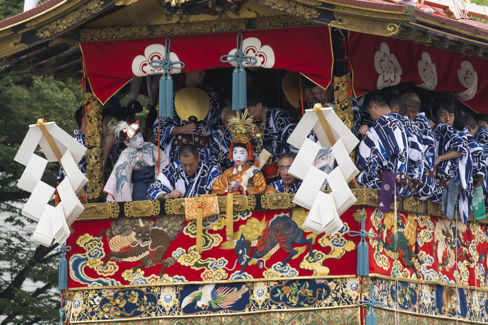 A Naginata Hoko float carrying a Chigo