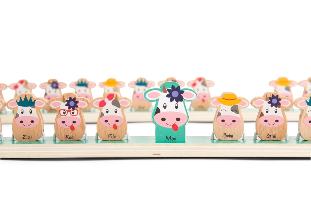 Children's toys with cows' shape