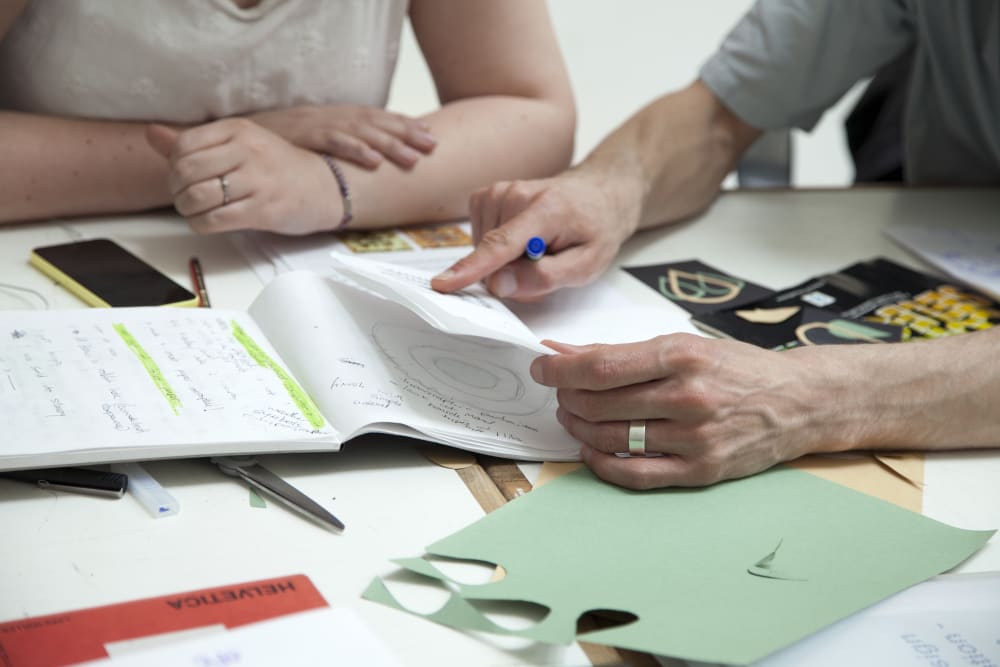 Short course student and tutor in discussion