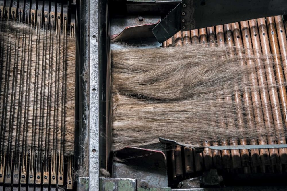 Linen going through a machine
