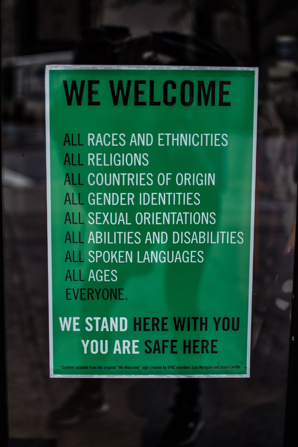 a poster indicating that everybody is welcome in this certain establishment
