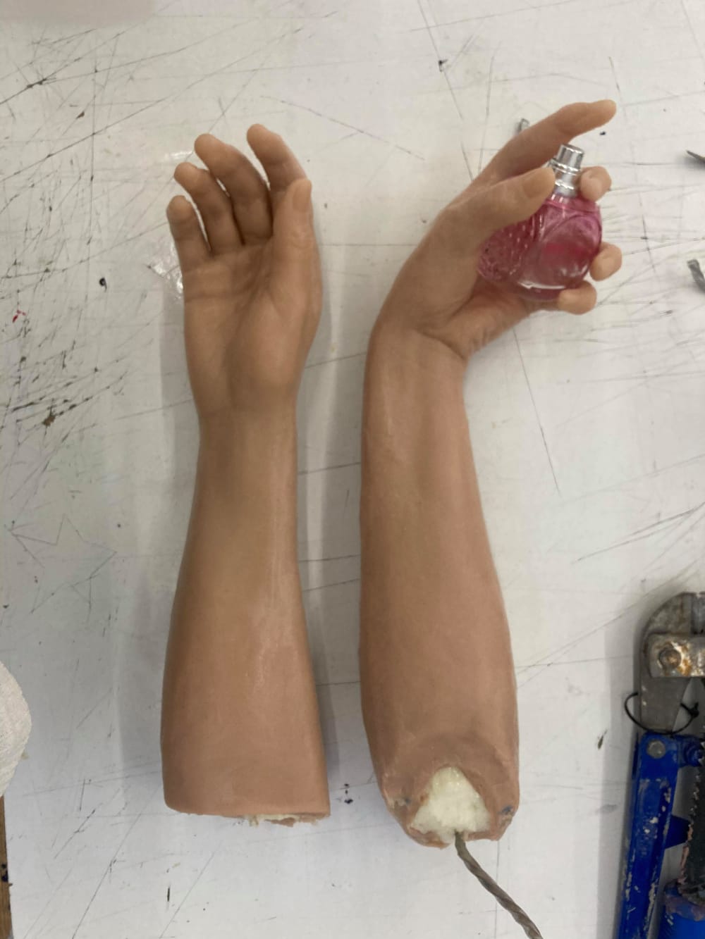  Hands casts after seaming and before painting. The hands have been created by taking a life cast from a model and casting this in monster clay. I then moulded these separately from the figure and attached to the figure before painting the whole piece together. 