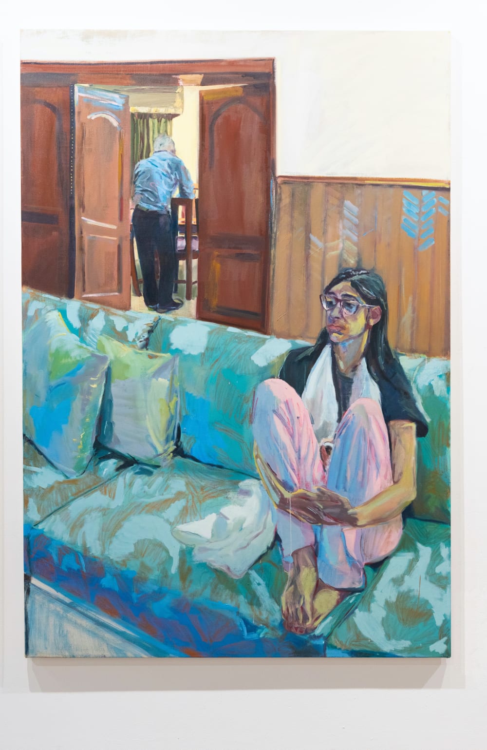 Painting of a woman sat on a sofa