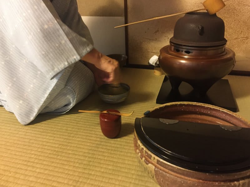 a person making tea