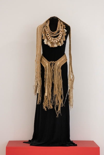 Black dress with gold adornment