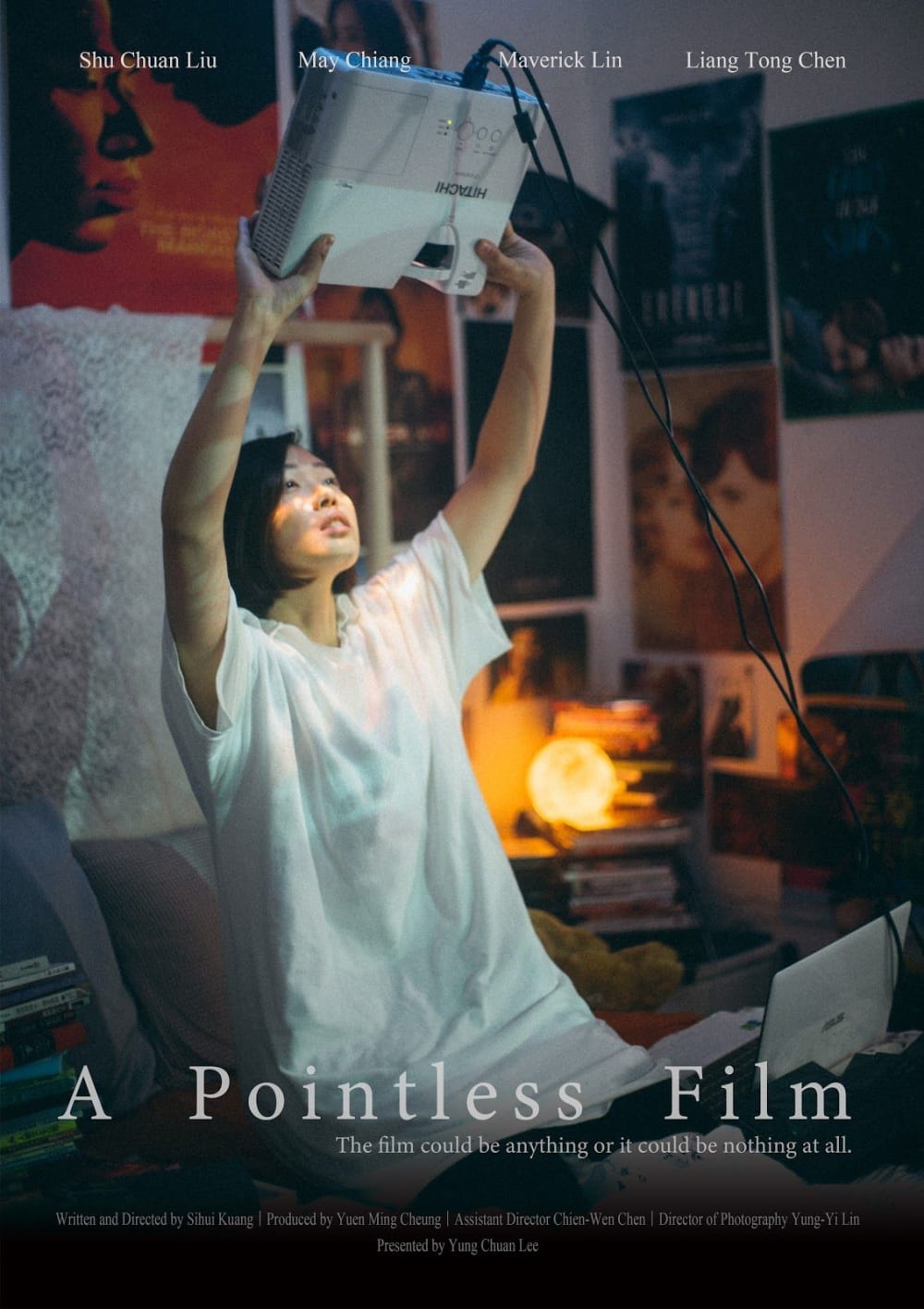 film poster of woman holding a projector above head and pointing it to face
