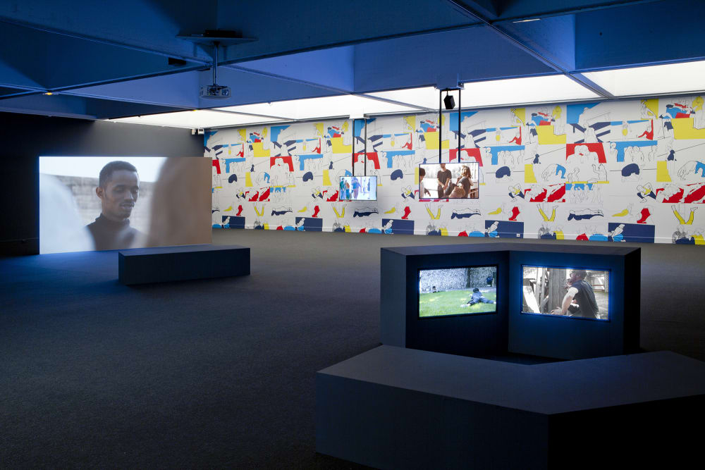 Nine-channel HD video installation with wallpaper
