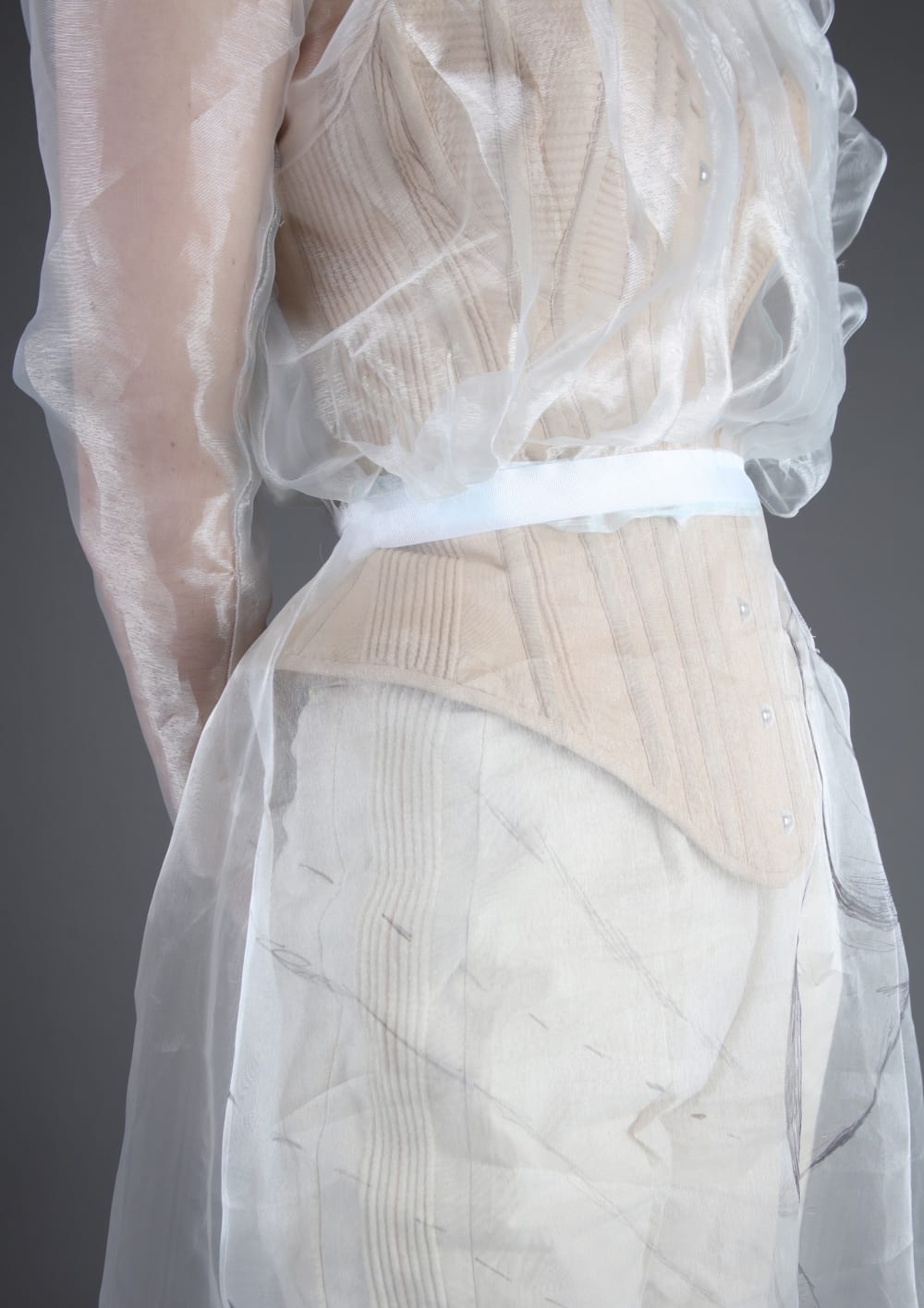 Detail of Evie's dress and corset