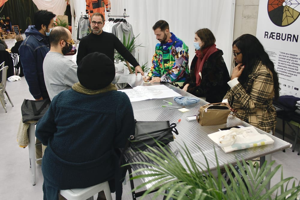 People working round a table