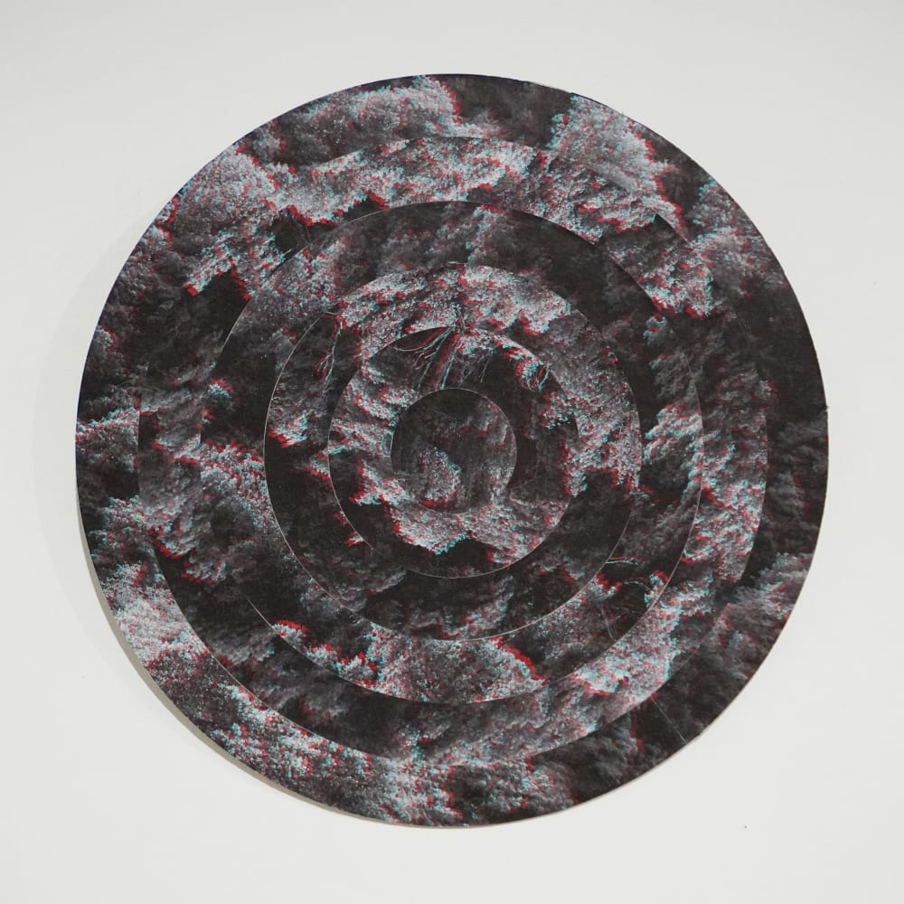 a photo of a mountain made of paper, cut out circularly to seem 3d