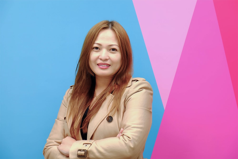 Image of a person smiling at the camera.