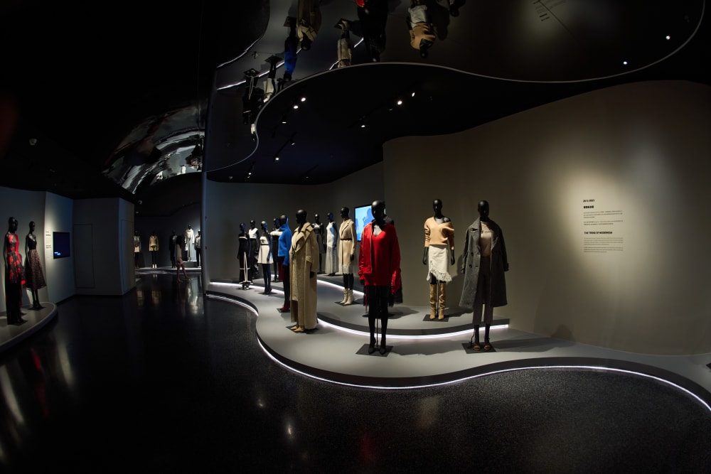 Mannequins standing on different levels, wearing clothes by Miss Sixty 