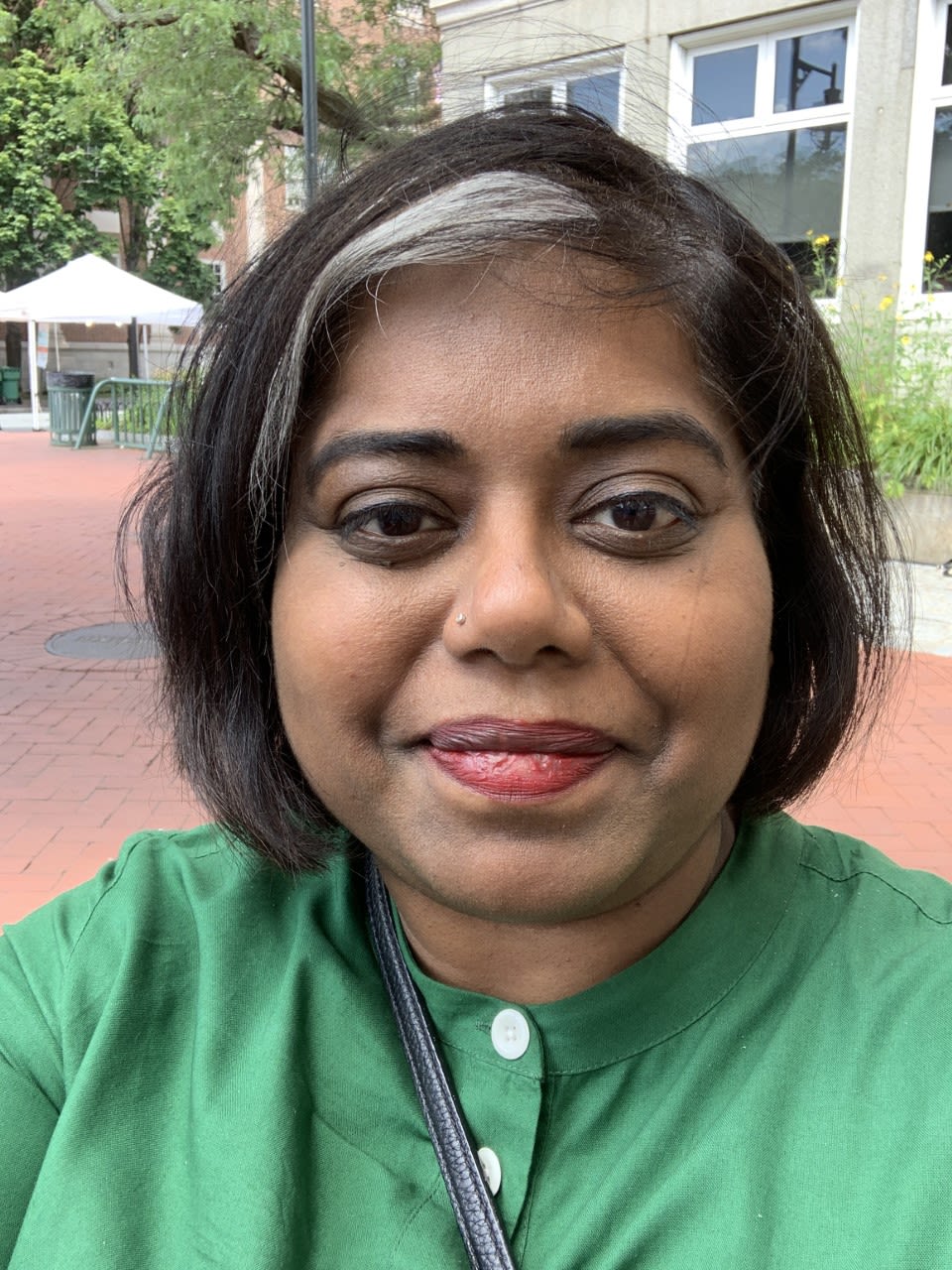 Portrait of woman wearing green
