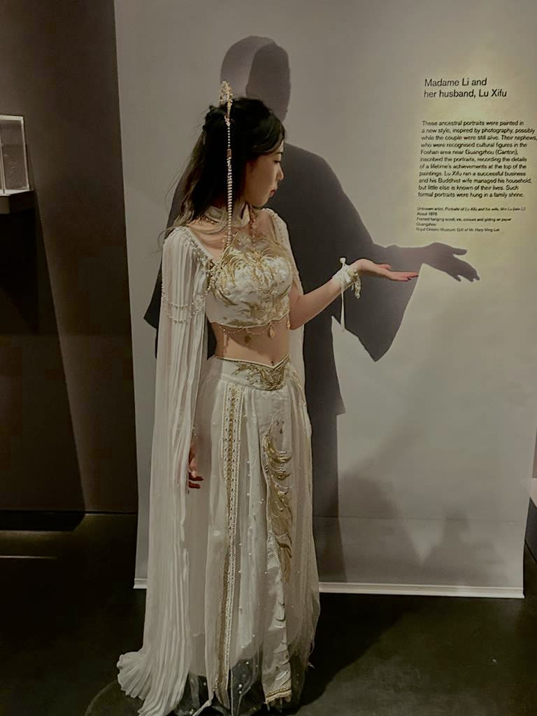 Woman dressed as 'Madame Li' by display of shadow