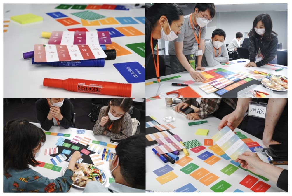A group of people using colourful movement cards
