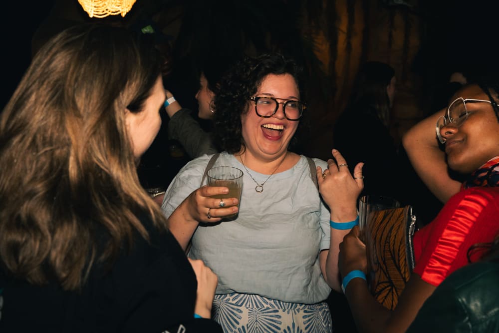 Close-up shot of a group of guests chatting