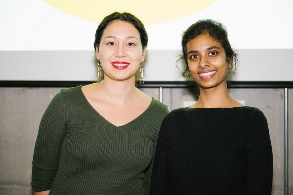 Photo of Ozge and Nanthini smiling to the camera