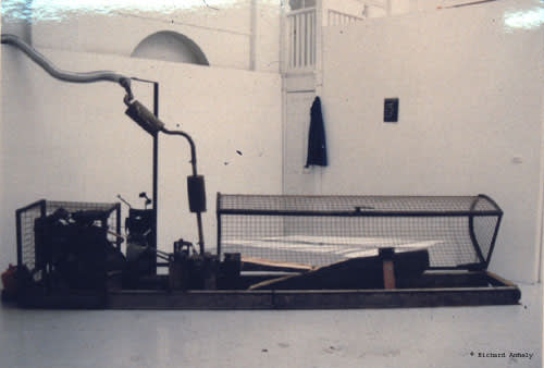 A photo of a box and some tubes - an installation piece