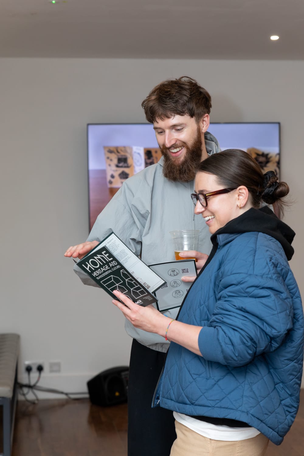 Guests reading a booklet