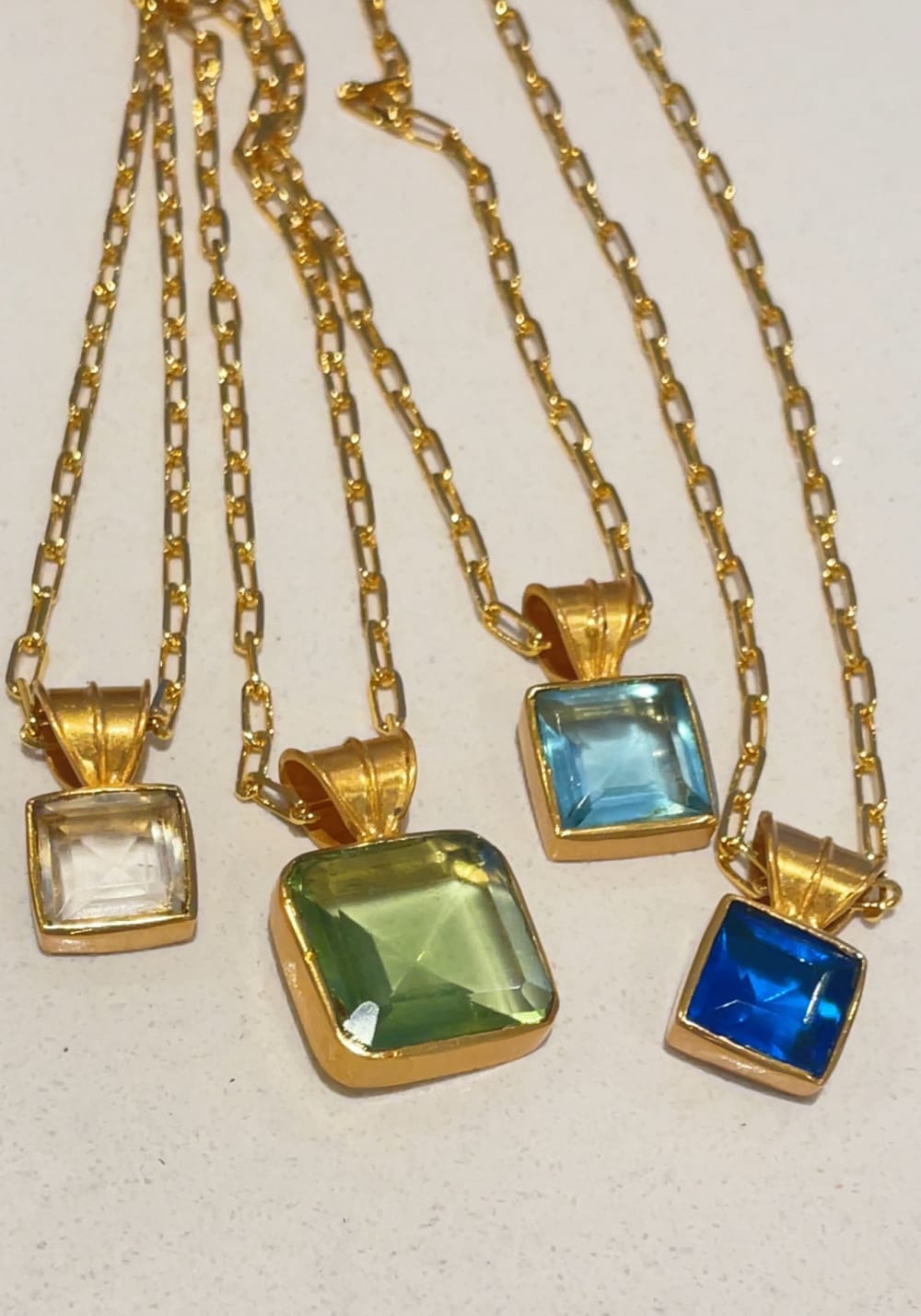 KOHI jewelry - gold and stones necklaces 