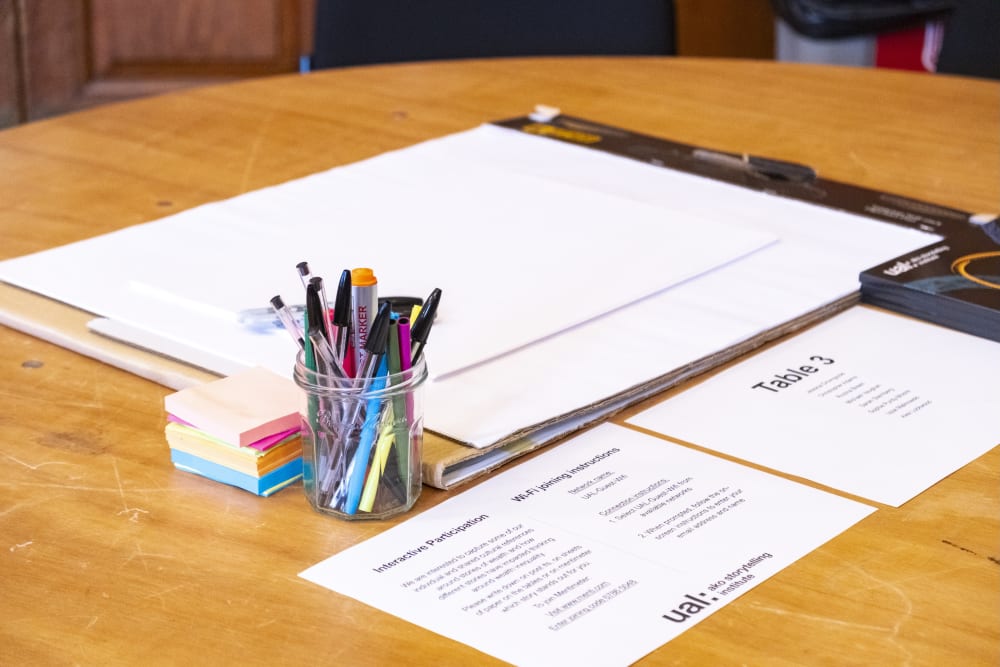 pens and paper on a desk