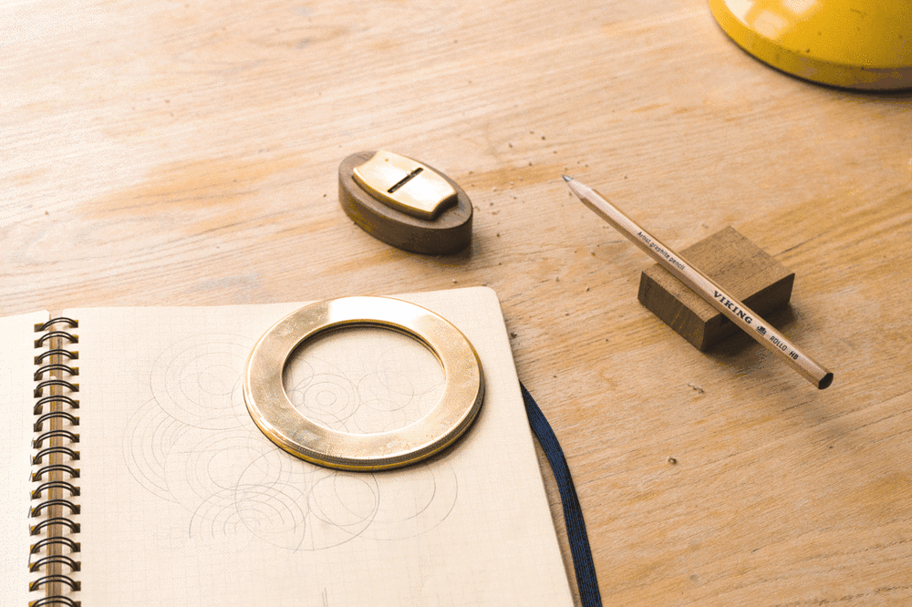 Pencil sharpener, pencil and paper