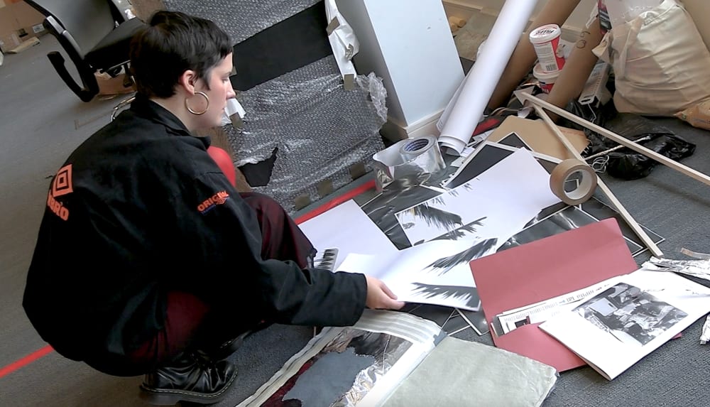 Serena planning work on the studio floor