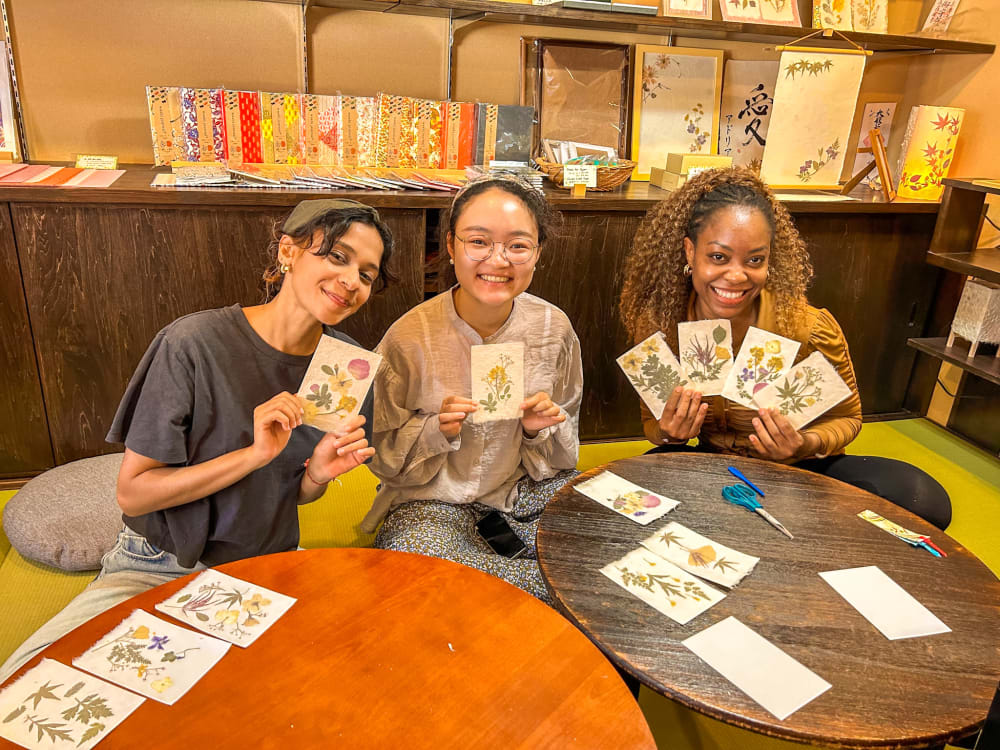 three students posing for a photograph