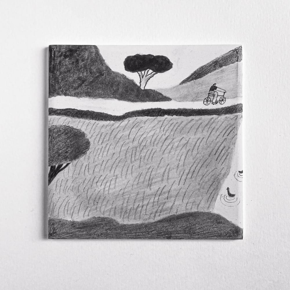 A painted tile depicting the trees of Burgess Park in black and white, with a person riding a bike. and white