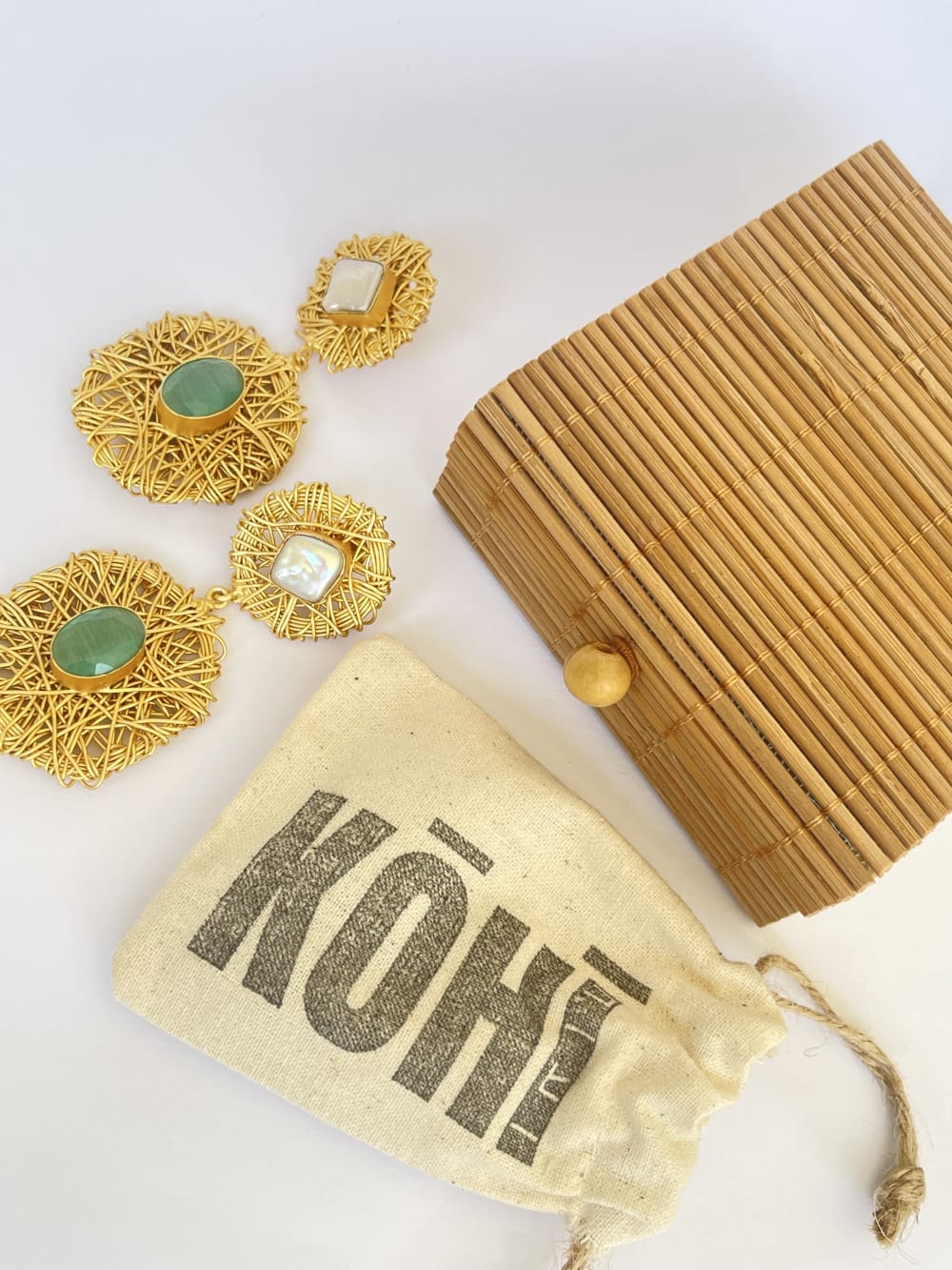 KOHI jewelry - gold and stones earrings and packaging