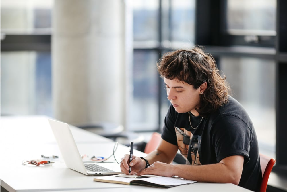 Image of Finn Weaver working on their laptop