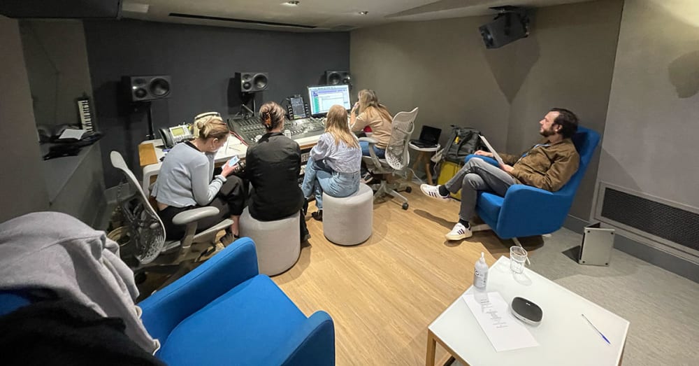 Image of people sitting in an office.