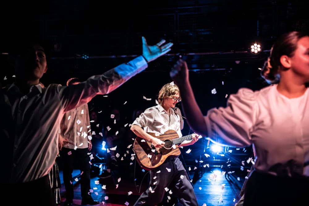 Performers on stage at Wimbledon College of Arts.