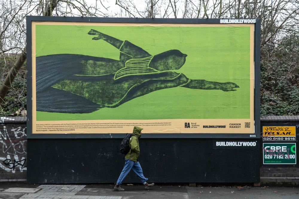 green billboard representing a person flying