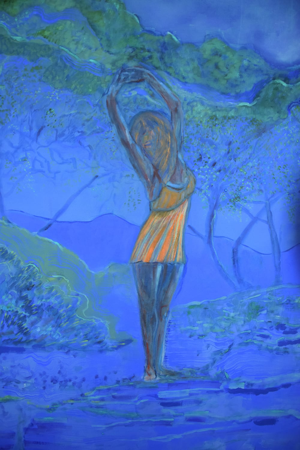 Blue canvas self portrait of girl dancing in beach