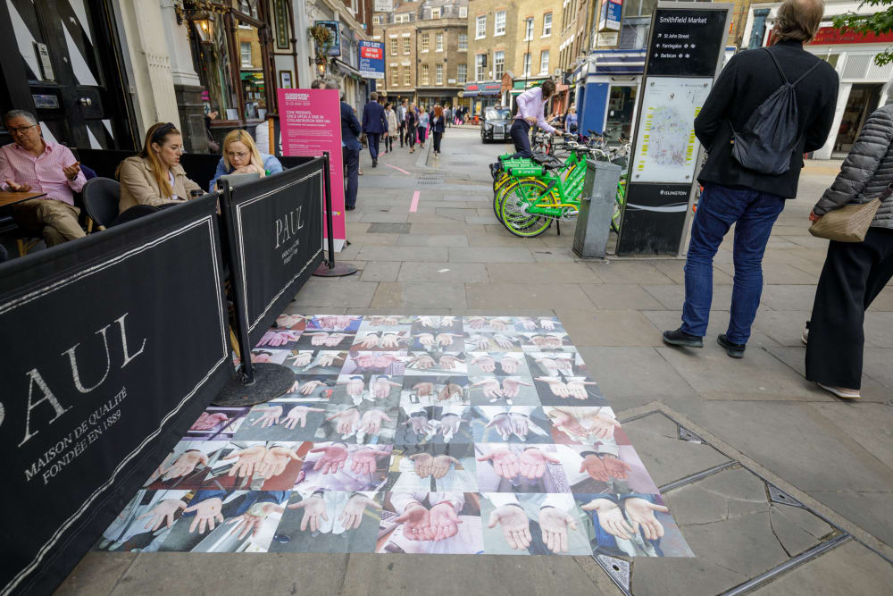 Carrie Maxwell design of photos of the hands of the people who work at Smithfield Market for Clerkenwell Design Week