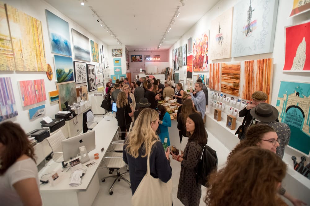 Photo of people visiting an exhibition