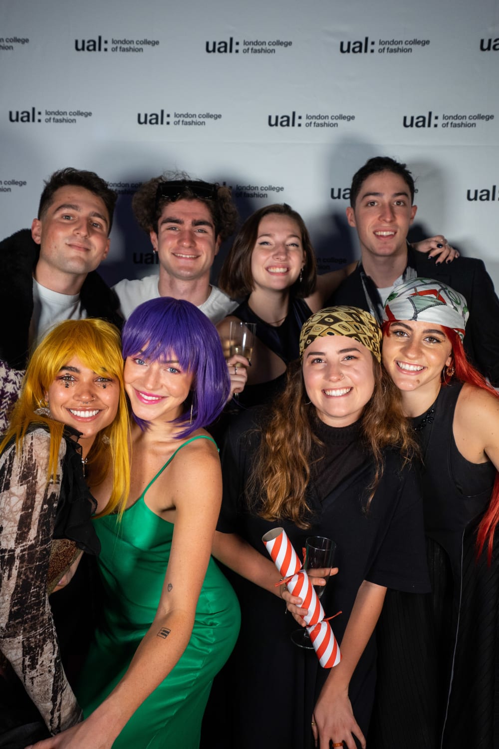 students in front of a flashboard