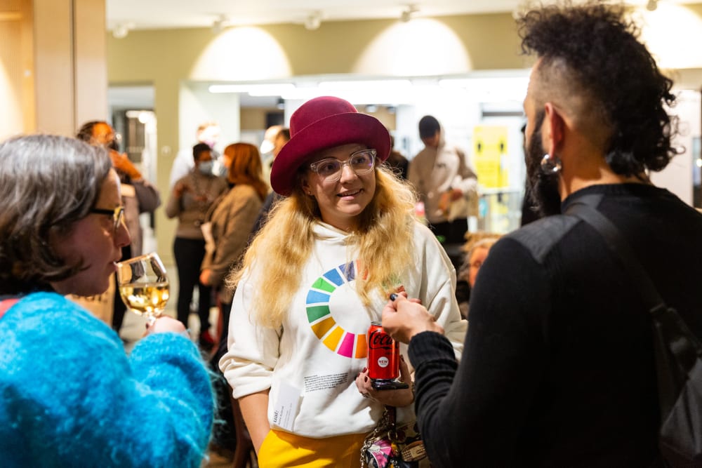 Katie talking to other guests