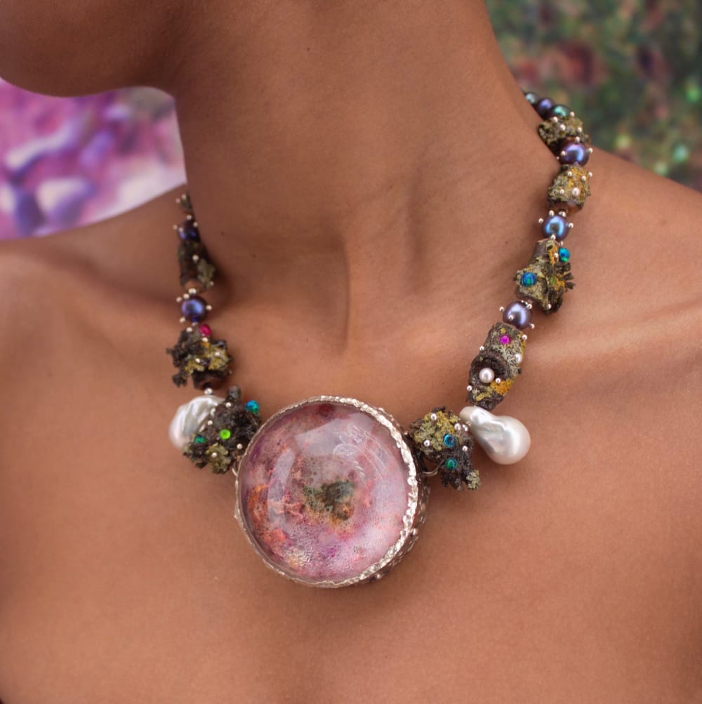 Person wearing heavy necklace