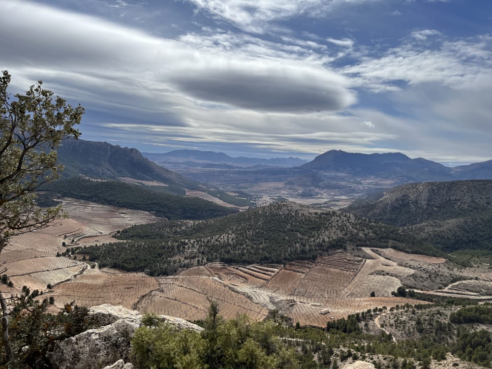 a landscape photo of a desert and clouds