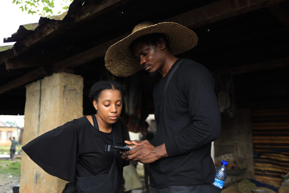 two people looking at a remote control for a drone