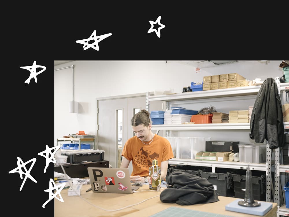 Person in a workshop at East Bank. Photography by Ana Blumenkron.